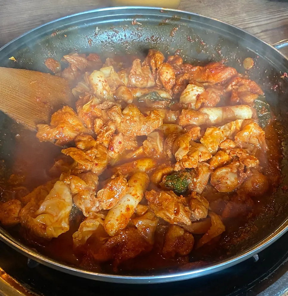 Dakgalbi cooking on the grill