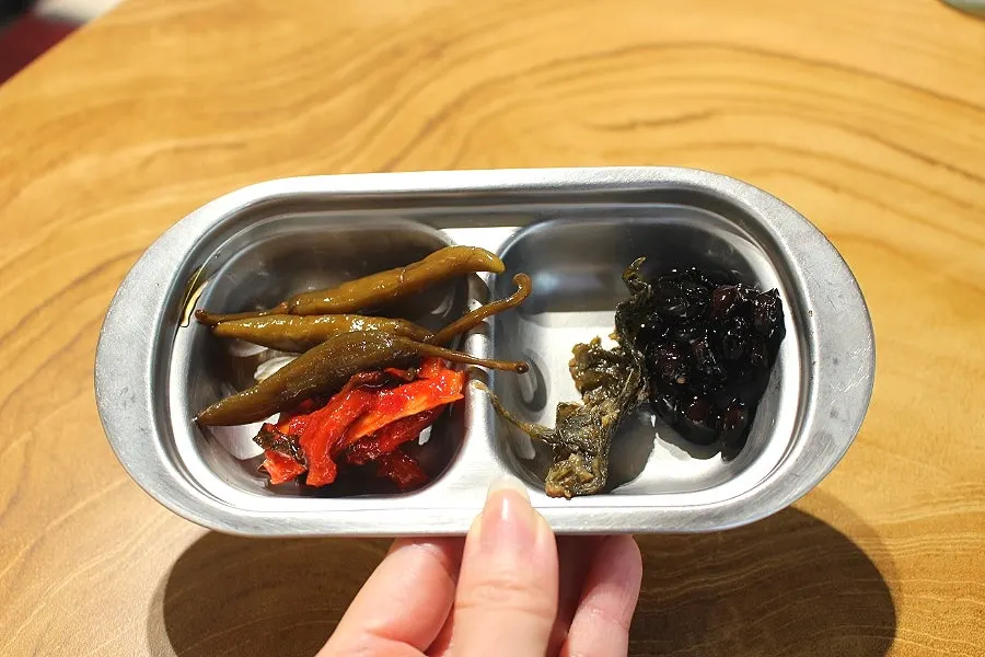 Crisp and tangy complimentary kimchi