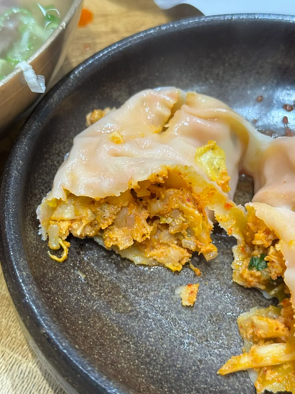 Cross-section of a kimchi king dumpling with kimchi filling