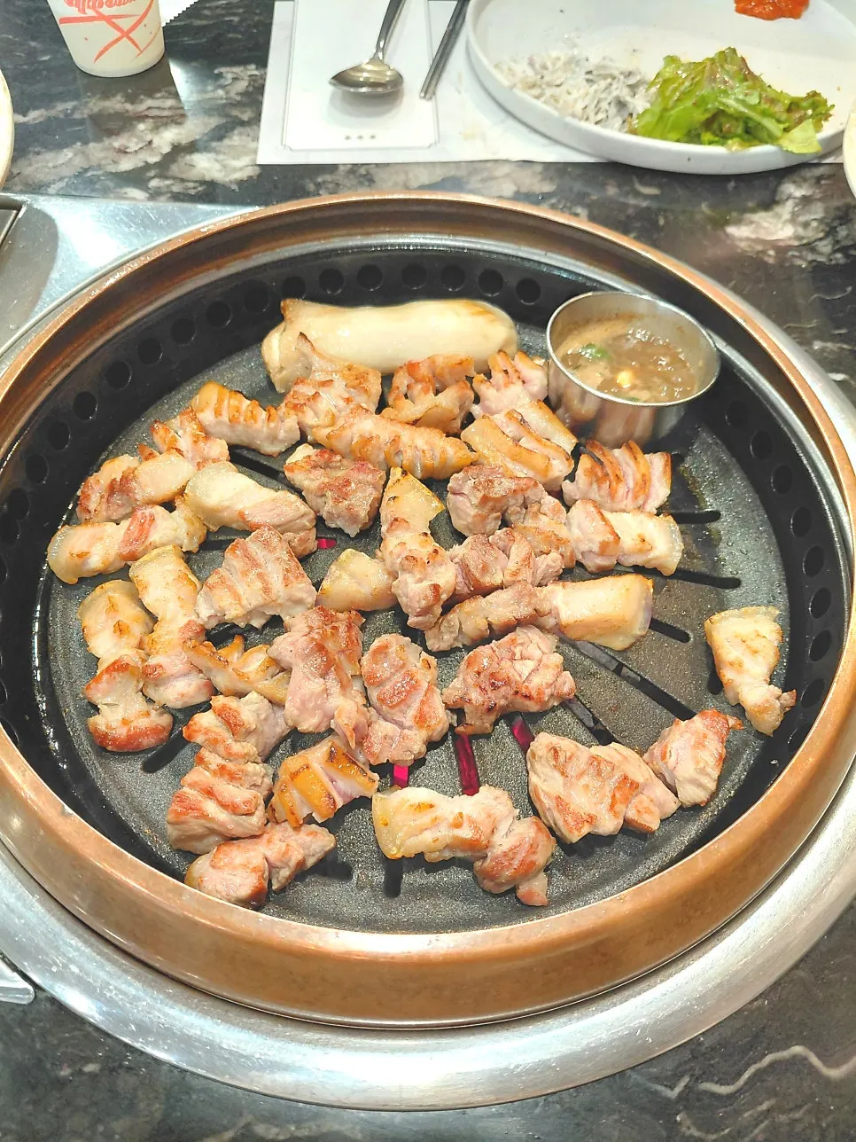 Staff grilling the meat directly
