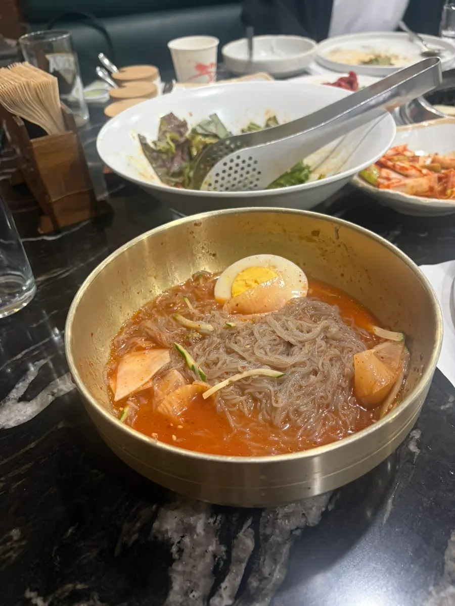 Hamheung bibim naengmyeon served with broth