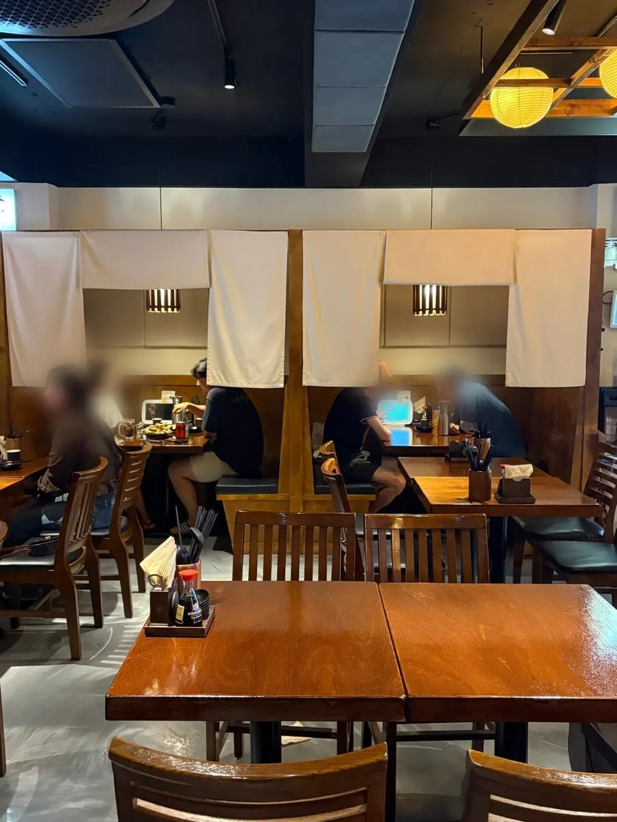 Softly lit dining hall at Izakaya Goko