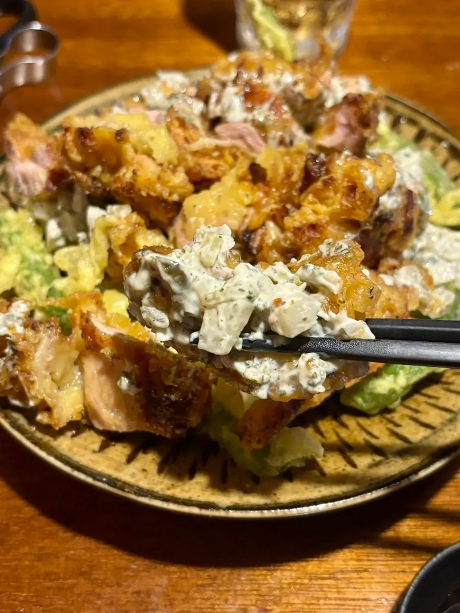 Plate of chicken nanban with fried chicken and fried peppers
