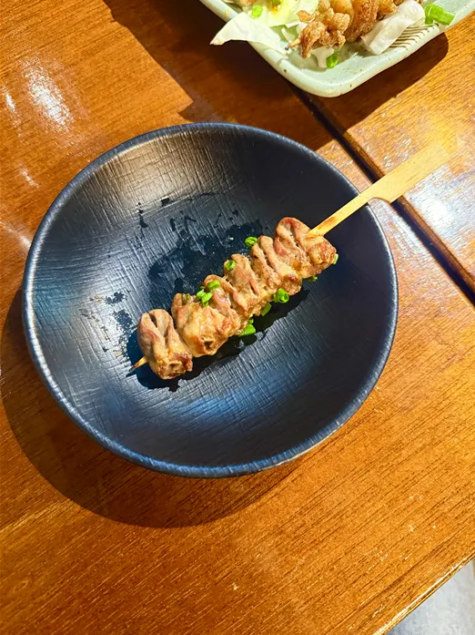 Close-up of chicken tenderloin skewer
