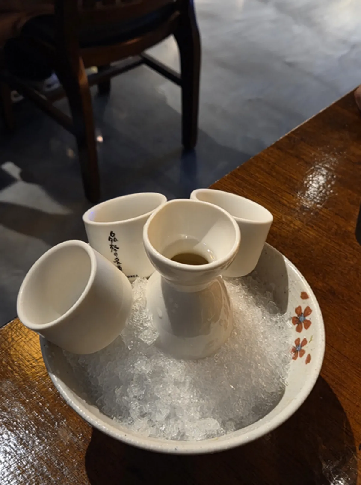 A bottle of cold tokkuri with a cup