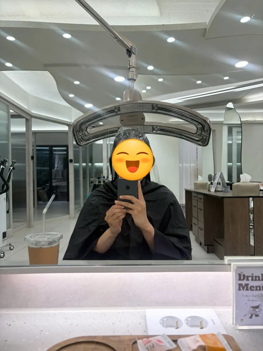 Carefully applying keratin to the hair