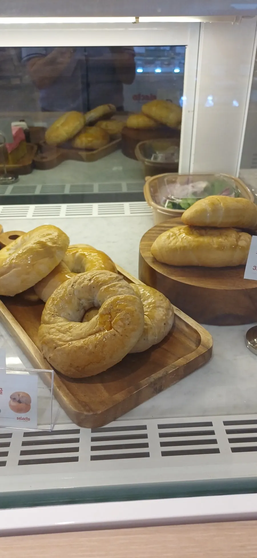 Bagels and salt bread on display