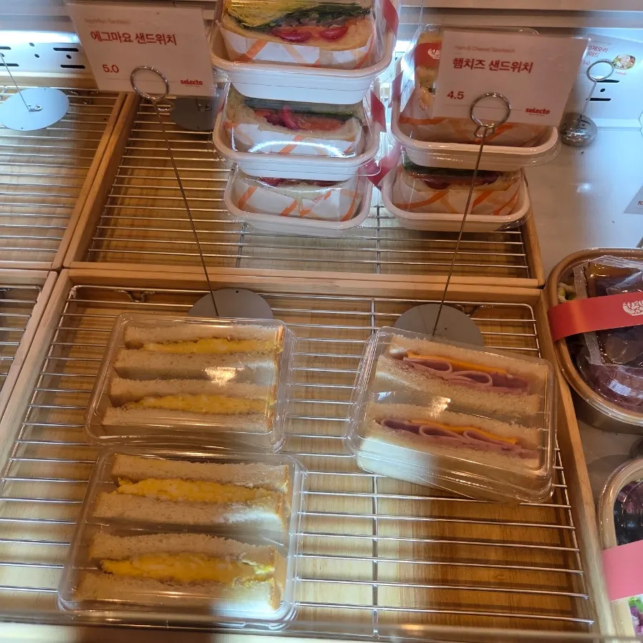 Egg mayo and ham and cheese sandwiches
