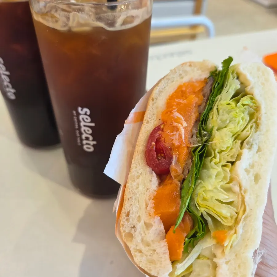 Smoked salmon sandwich paired with an Americano