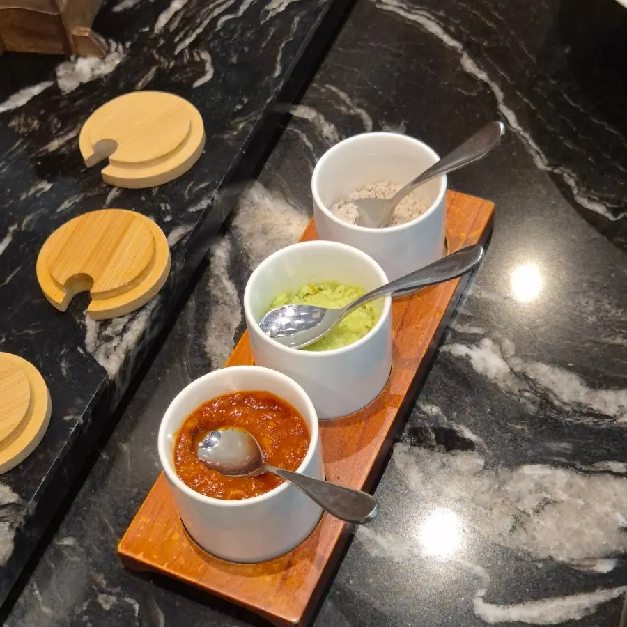 Ssamjang, wasabi, and salt portioned onto a plate