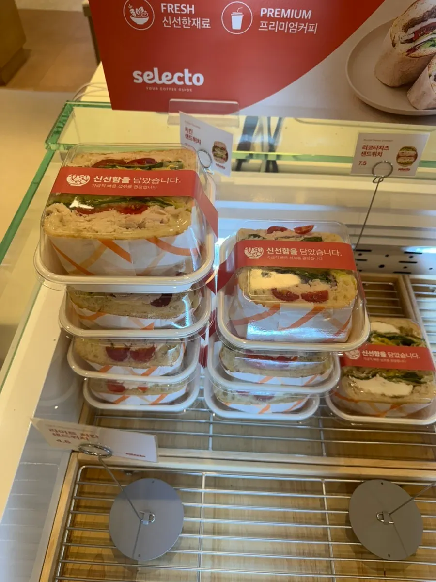 Refrigerated case with sandwiches and salads