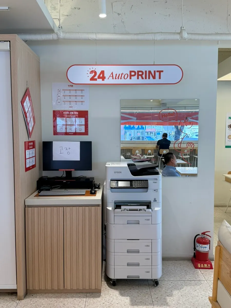 Unmanned print zone set up inside the café