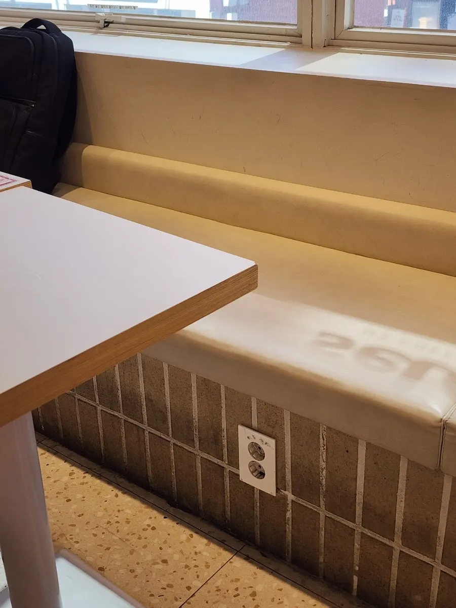 Seating arranged for laptop work