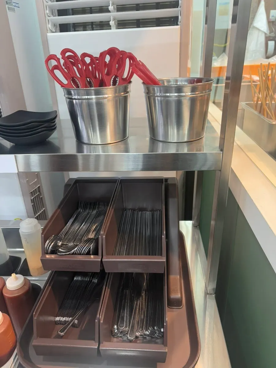 Self-serve bar with tableware and small plates