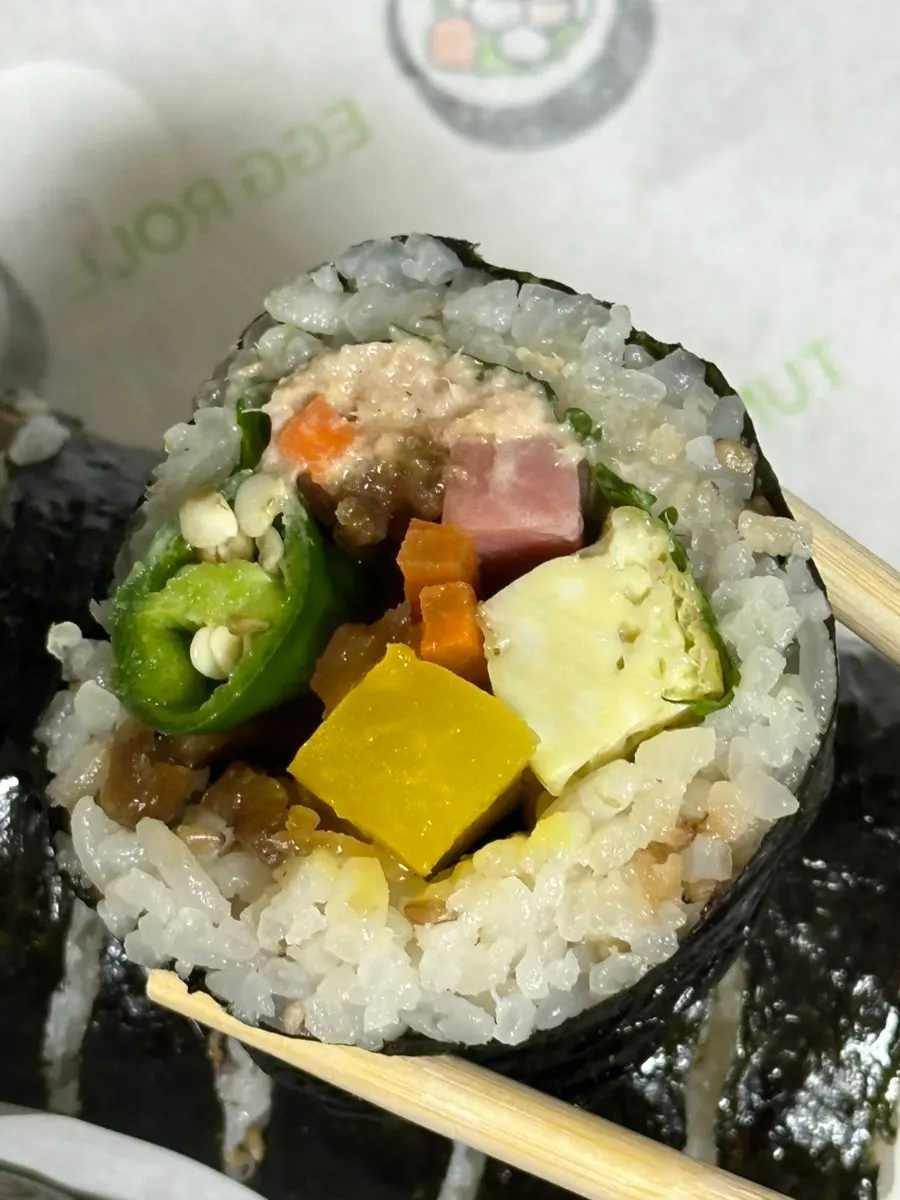 Cross-section of a thickly cut spicy tuna gimbap