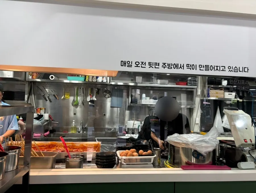 Tteokbokki simmering in the open kitchen