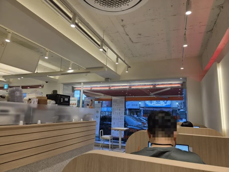 Café interior with a variety of seats