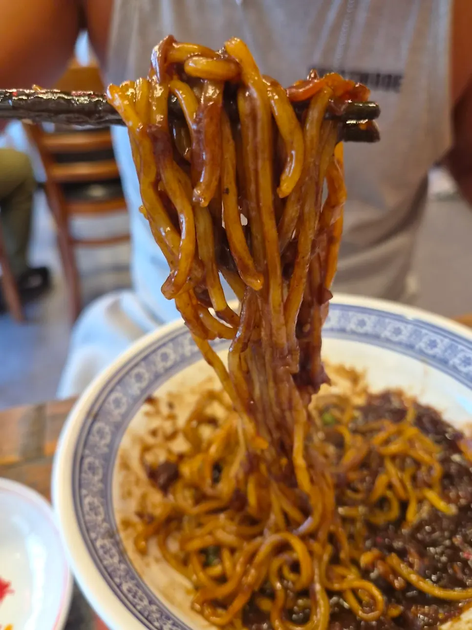 Close-up of glossy jjajangmyeon noodles