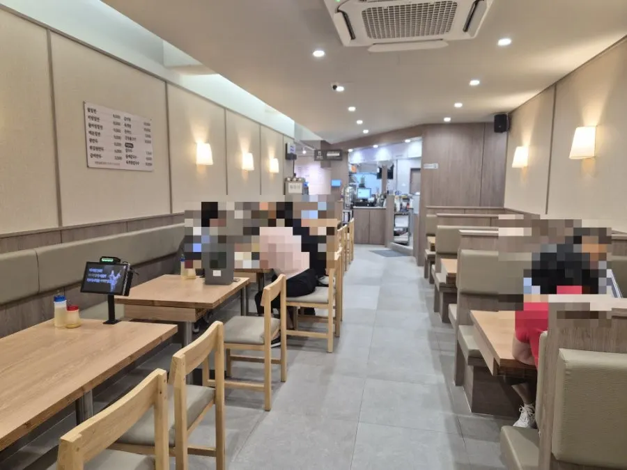 Entrance of the busy milmyeon restaurant