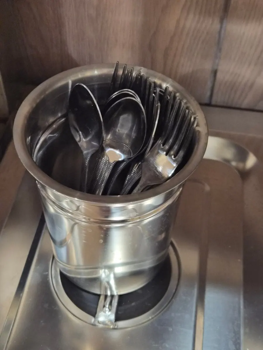 Self-serve bar with utensils and supplies