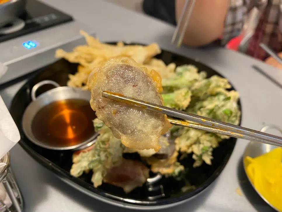 Assorted fritters served with soy dipping sauce