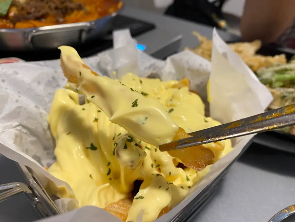 French fries topped with butter garlic sauce