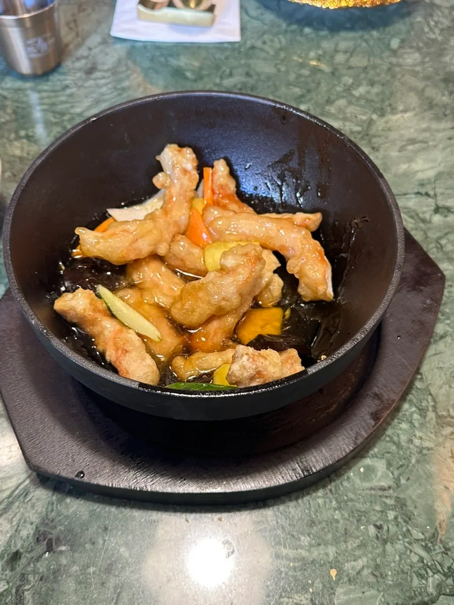 Close-up of buttered Tokyo tangsuyuk