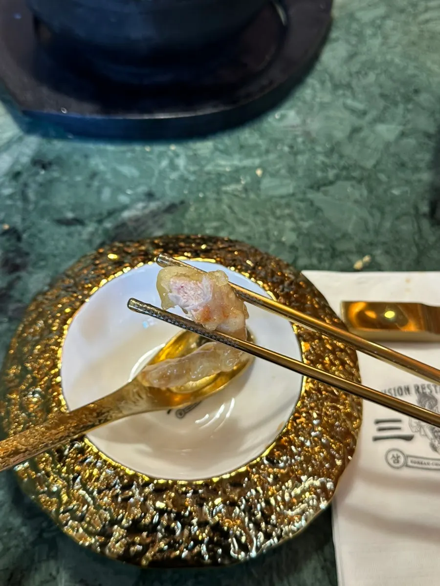 Plate of Tokyo tangsuyuk with sauce poured on
