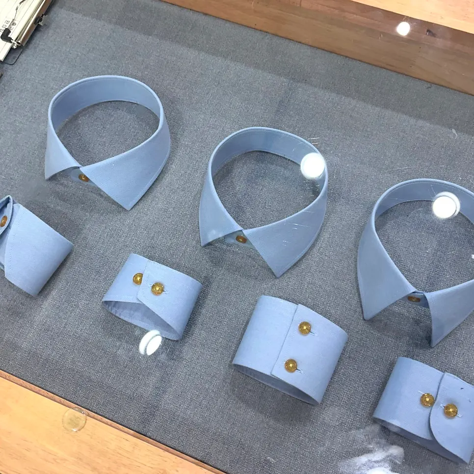 Sample suits on display in the store