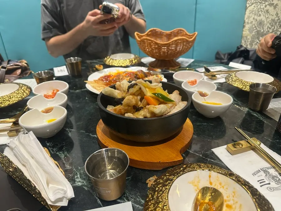 Table spread of fusion Chinese dishes