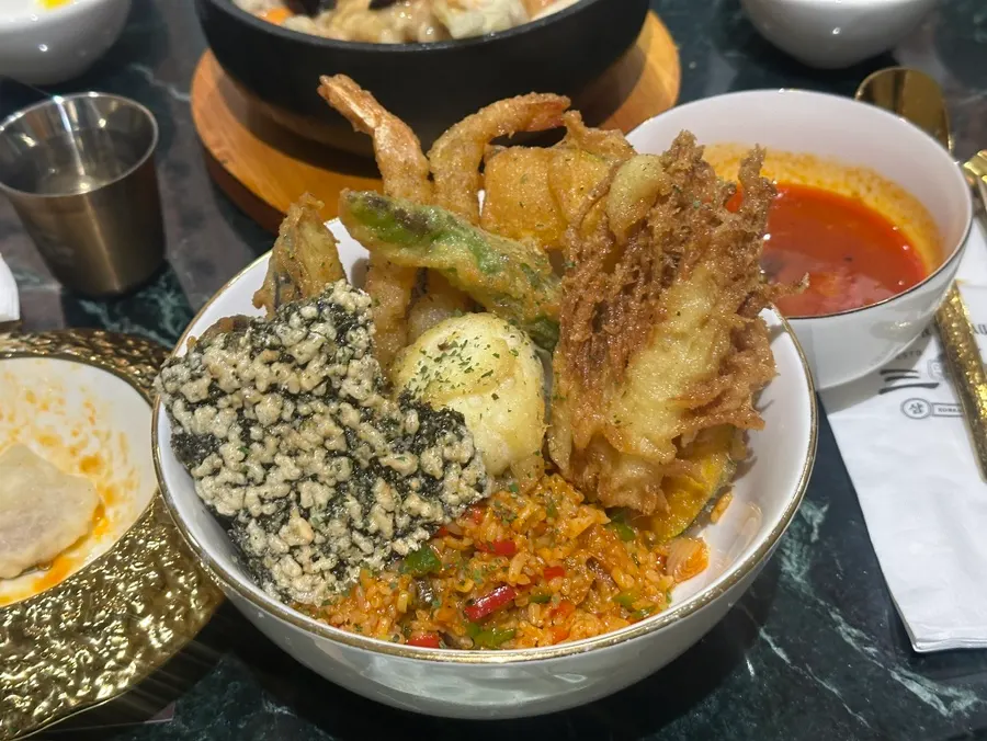 Crab fried rice and other rice dishes on the table