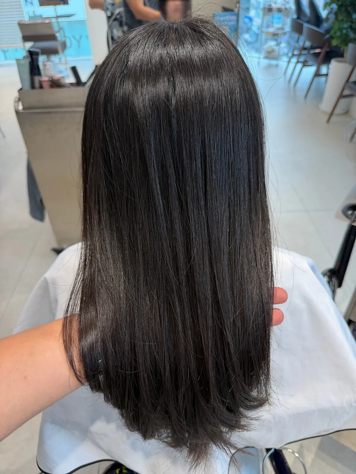 Back view of long hair with restored shine