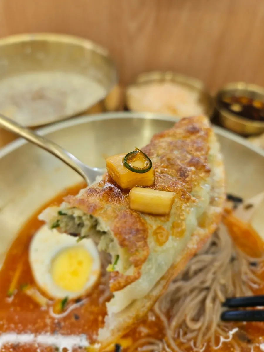 Cross-section of a fried dumpling packed with filling