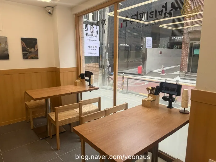 Interior of Sammiri Makguksu with generous table spacing