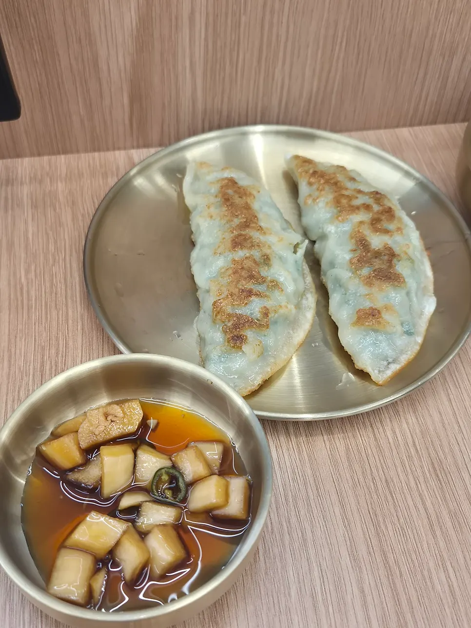 Table setting with the half-plate of crispy fried mandu