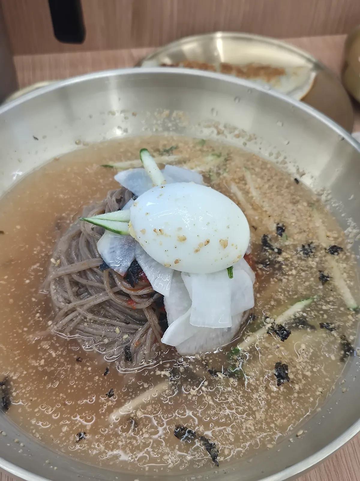 A bowl of spicy mul-makguksu at Sammiri Makguksu
