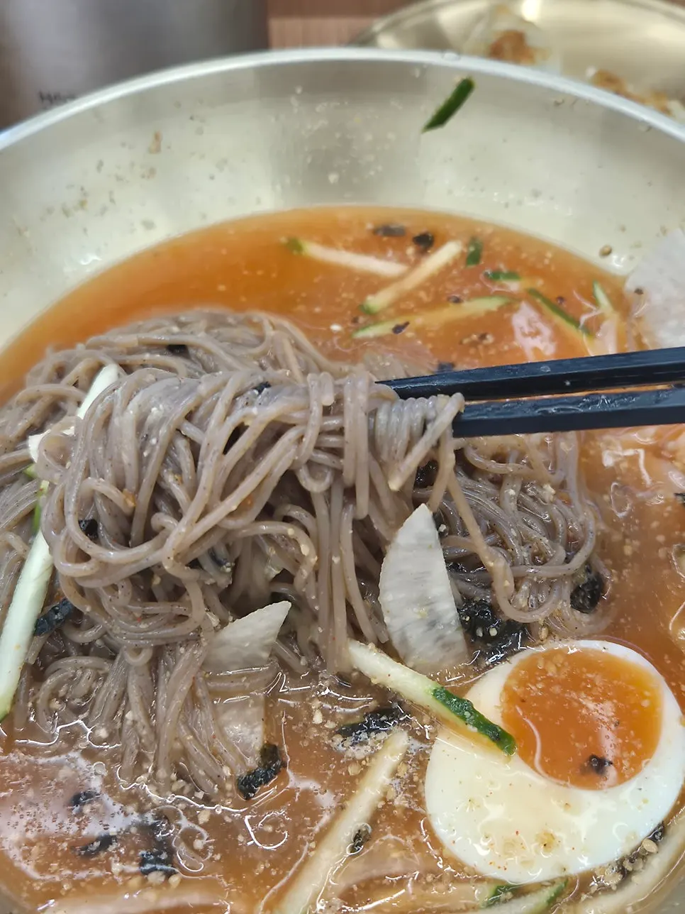 Nearly finished bowl of makguksu