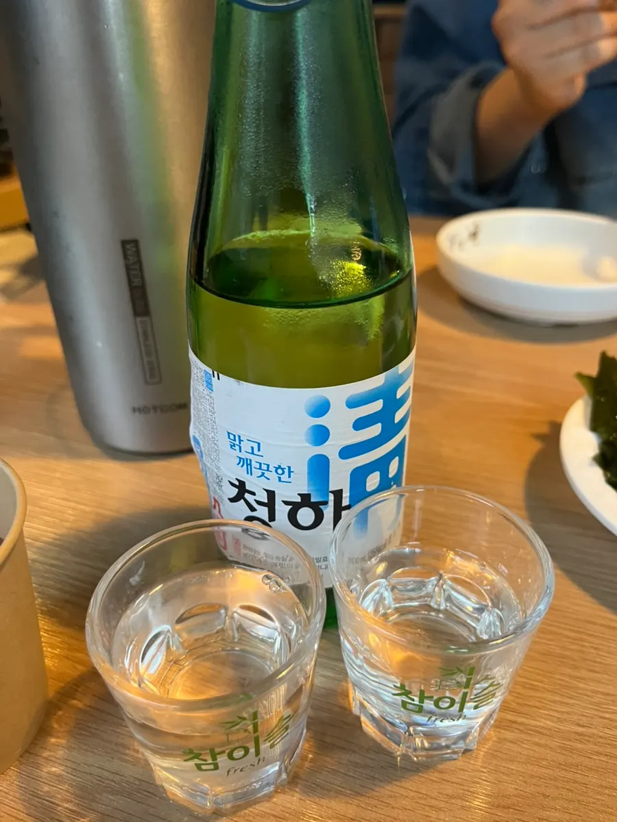 A glass of cheongha paired with seafood