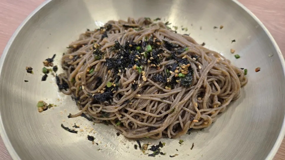 Perilla oil pooled beneath the noodles