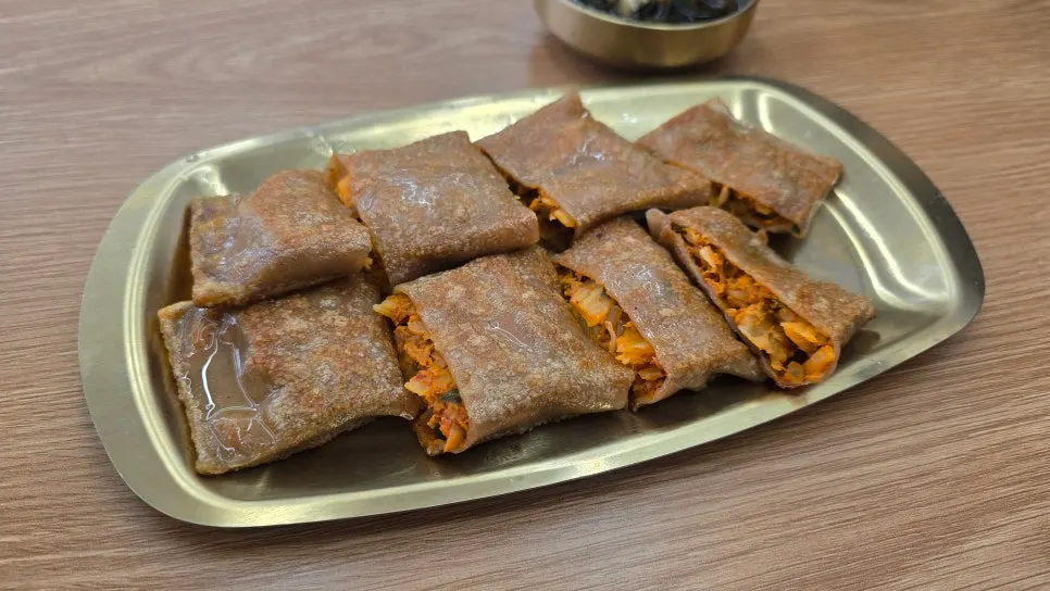 Cross-section of the buckwheat pancake with spicy filling