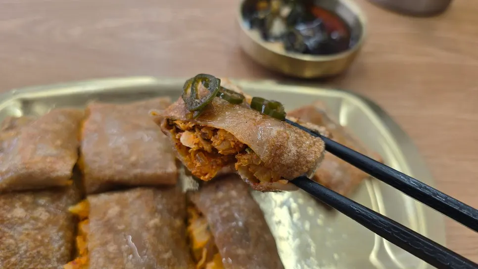 Buckwheat pancake served with scallion soy sauce