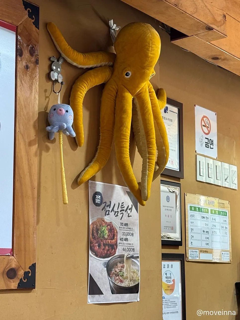 Octopus- and squid-shaped decorations and figurines hanging in the restaurant