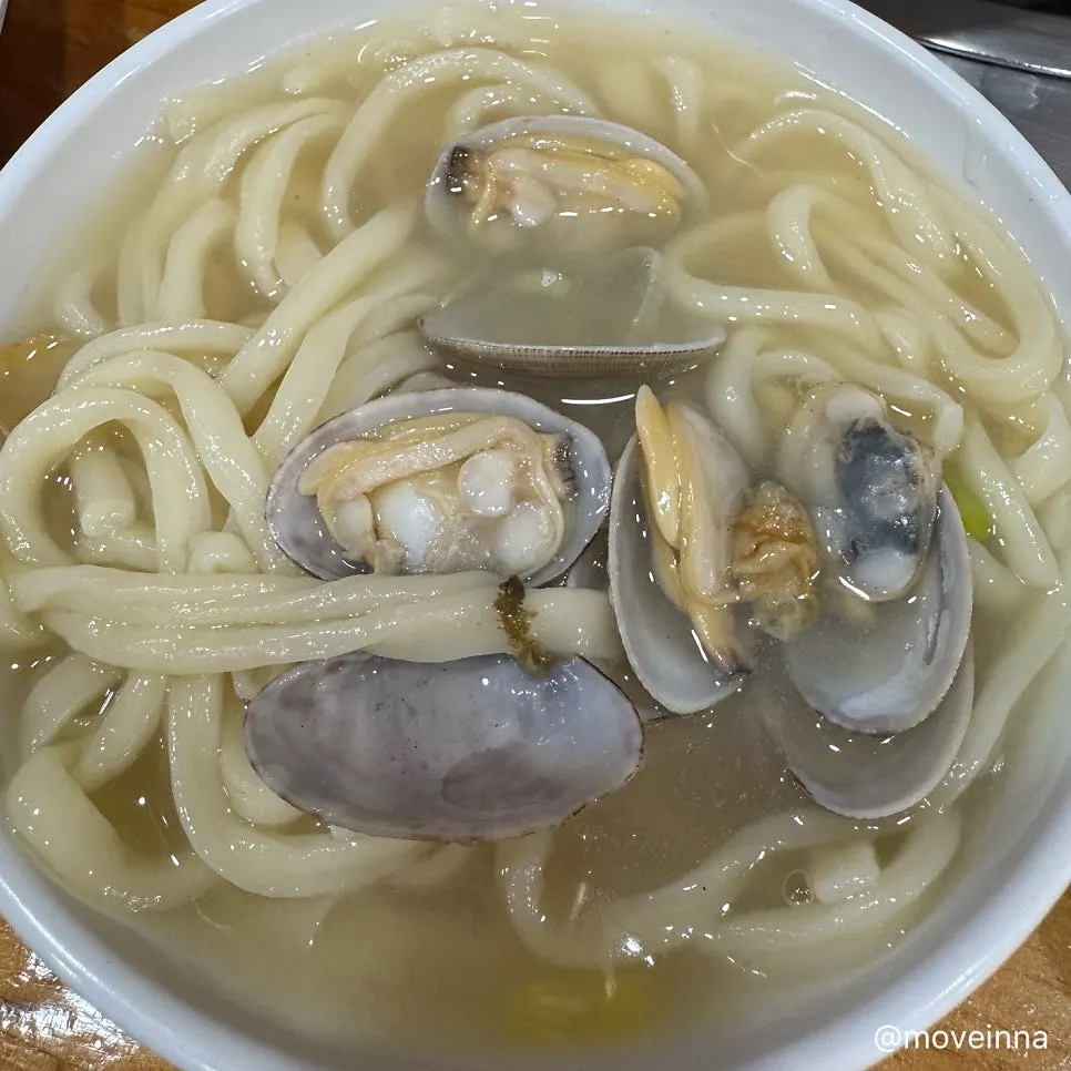 Kalguksu noodles served into a bowl