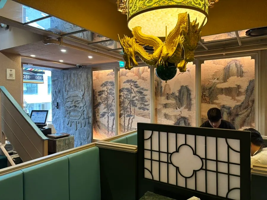 Grand stone statue on the restaurant's first floor