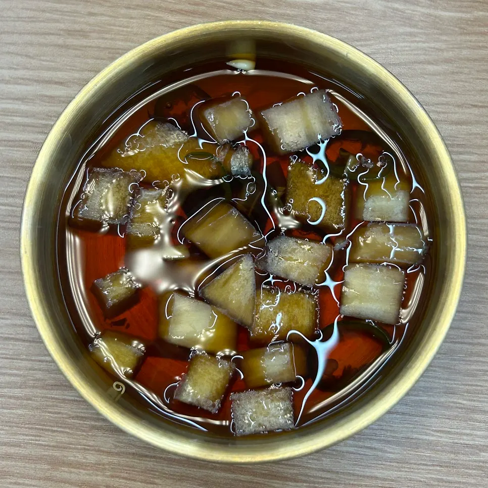 Small dish of soy sauce for dipping mandu