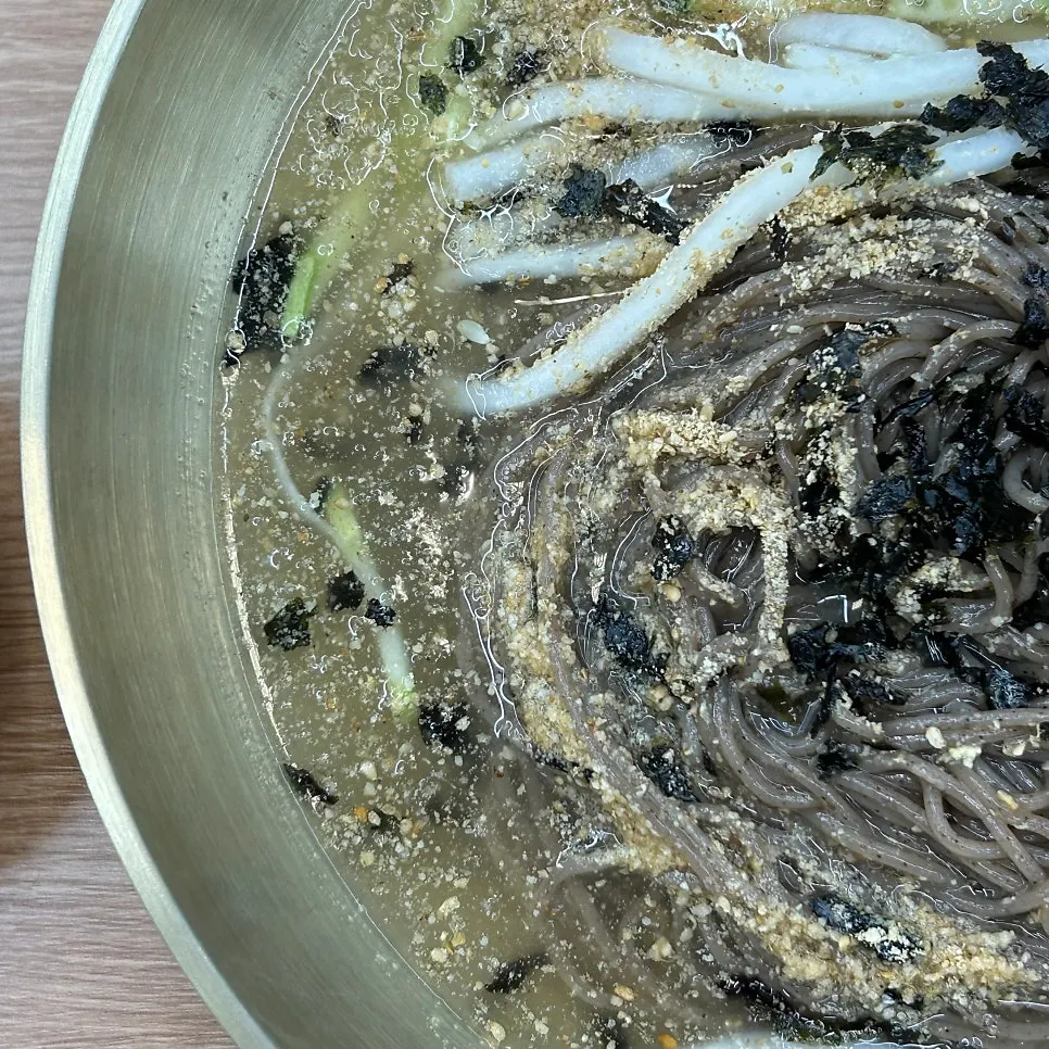 Chilled dongchimi broth with buckwheat noodles