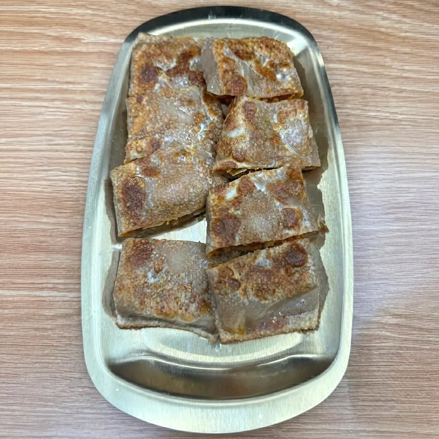A plate of Sammiri Makguksu's buckwheat pancake