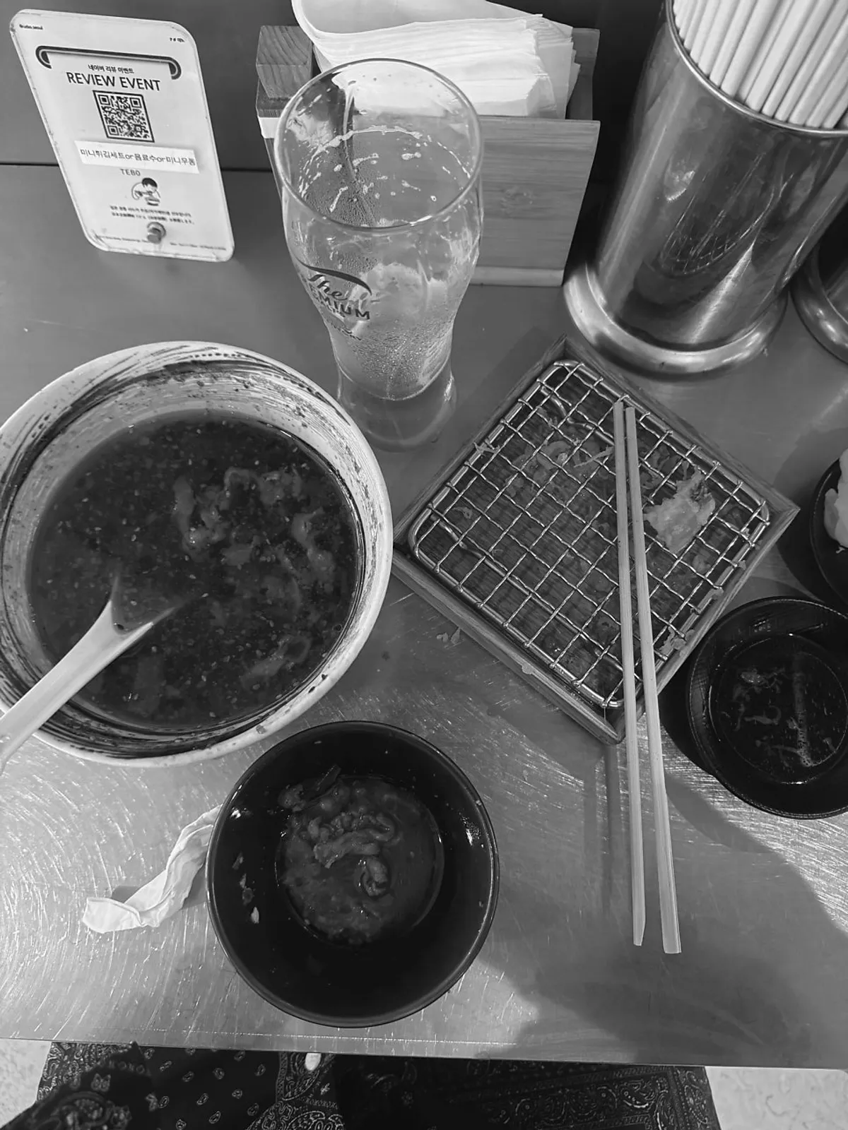 Vertical photo introducing mala udon with tempura and draft beer