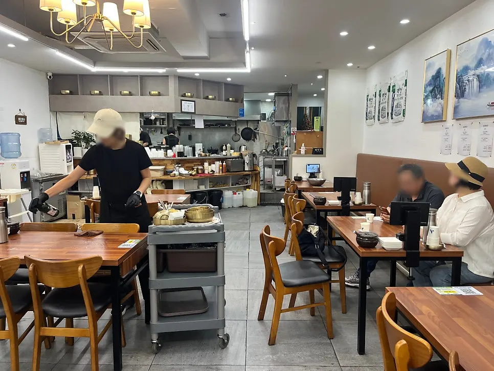 Dining room at Sinseon Myeonga with several diners