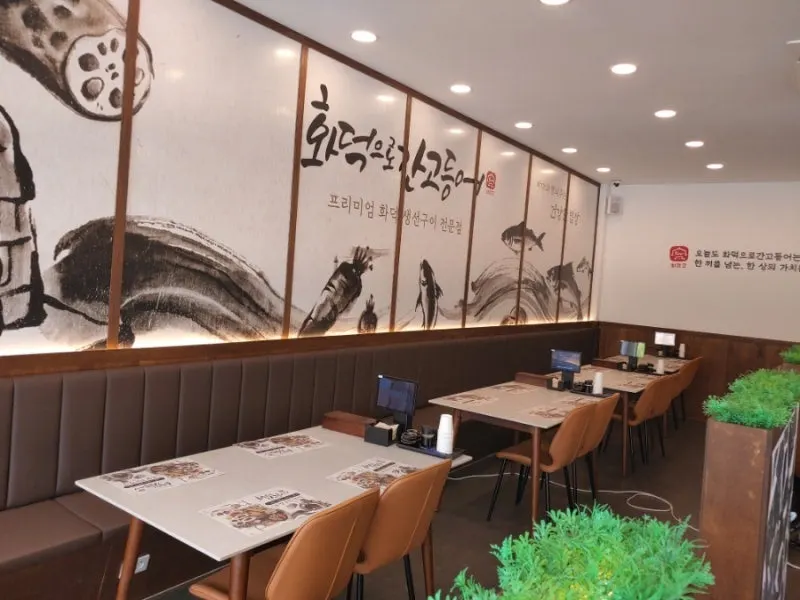 High-ceilinged, open dining hall interior
